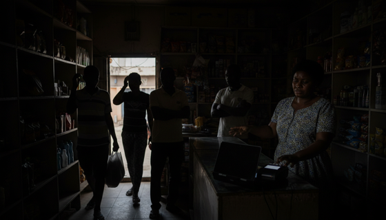 A shop trading in darkness during a power cut